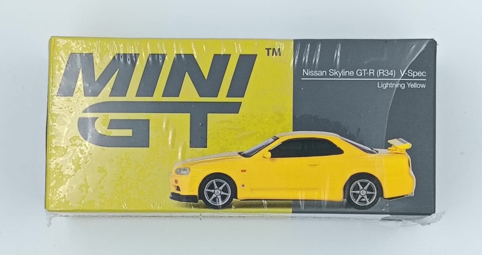 MINI GT BOX Nissan Skyline GT-R (R34) V-Spec (UNSEALED) - Image 1