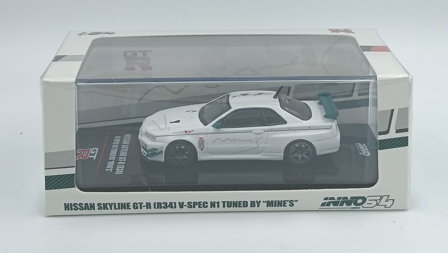 INNO64 NISSAN SKYLINE GT-R (R34) V-SPEC N1 TUNED BY "MINES" - Image 1